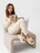 The Velune Cross Plush Slippers